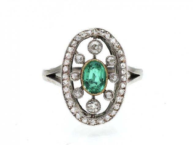 Edwardian emerald and diamond open oval cluster ring