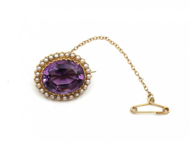 Antique amethyst and seed pearl oval brooch in yellow gold