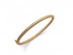 Vintage 18kt yellow gold frosted spring hinged bangle