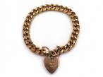 Antique 9kt yellow gold close curb bracelet with heart lock