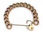 1971 heavy 9kt yellow gold curb bracelet with heart lock