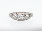 Art Deco three stone openwork cluster in platinum