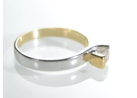 Contemporary two tone 18kt gold diamond solitaire twist ring