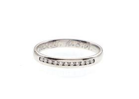 Platinum diamond channel set half eternity ring