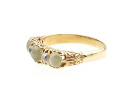 Antique cat's eye chrysoberyl and diamond carved ring in gold