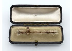 Antique 9kt yellow gold owl bar brooch with ruby eyes