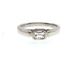Art Deco emerald cut east to west diamond solitaire