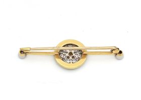 Edwardian peridot diamond and green enamel 'Mabel' pin