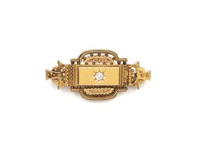 Etruscan revival 15kt yellow gold and diamond brooch