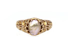 Natural pearl carved ring in yellow gold