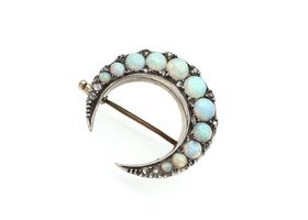 Victorian opal set crescent moon brooch in silver on gold