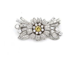 Vintage 1950s fancy yellow diamond and diamond flower brooch