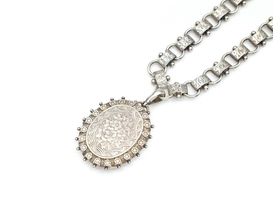Antique sterling silver chain and large elaborate oval locket