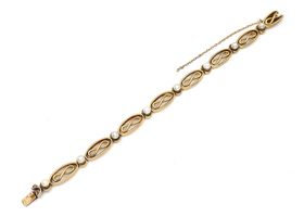 French 18kt yellow gold infinity bracelet set with pearls