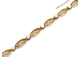 French 18kt yellow gold infinity bracelet set with pearls