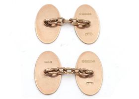 1924 oval engine turned cufflinks in 9kt rose gold