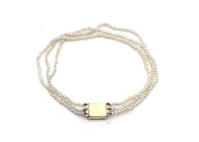 Georgian three strand seed pearl bracelet with gold clasp