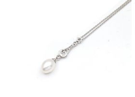 18kt white gold diamond and pearl drop pendant and chain