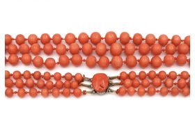 Antique beaded three strand coral necklace with silver clasp