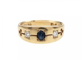 1884 sapphire and diamond three stone ring in 18kt yellow gold