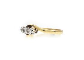 Vintage three stone diamond twist ring in 18kt gold