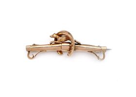 Antique 9kt rose gold hunting brooch