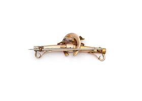 Antique 9kt rose gold hunting brooch