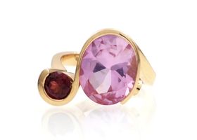 Vintage two stone dress ring with pink synthetic sapphire and garnet