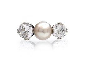 Edwardian natural pearl and diamond three stone ring