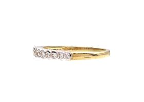 Diamond rubover set half eternity ring in 9kt yellow gold