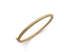 Vintage 18kt yellow gold frosted spring hinged bangle