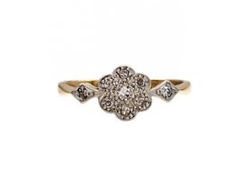 Antique diamond daisy cluster ring in 18kt gold