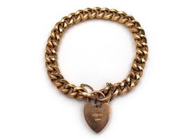 Antique 9kt yellow gold close curb bracelet with heart lock
