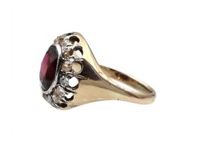 Antique garnet and diamond oval cluster ring in 18kt yellow gold