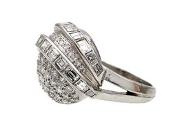 1940s American diamond set globe ring in platinum