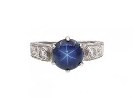 Vintage synthetic star sapphire and diamond ring in platinum