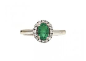 Vintage emerald and diamond oval cluster ring in 14kt white gold