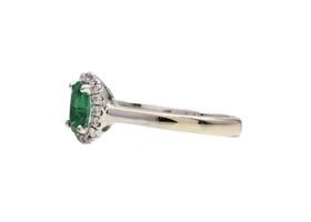 Vintage emerald and diamond oval cluster ring in 14kt white gold
